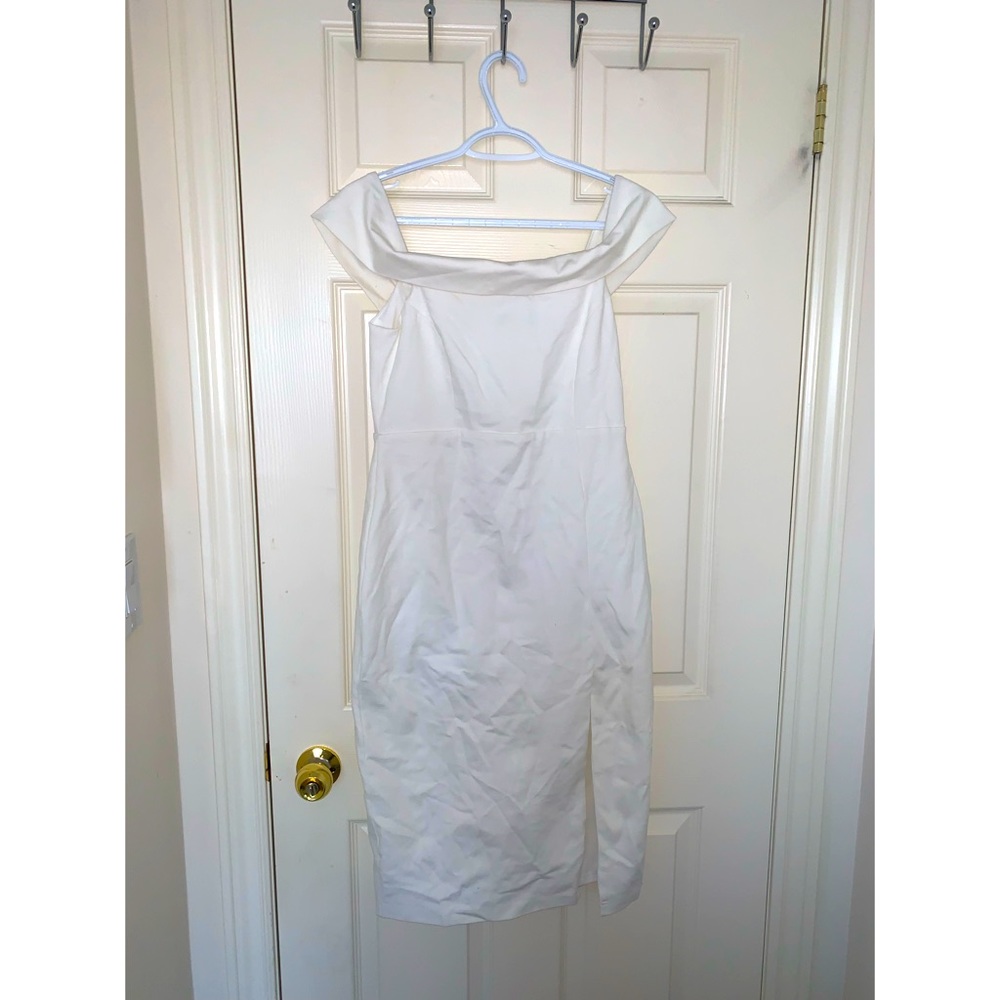 This is a white dress by the brand Lulu’s!